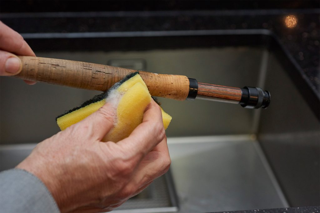 Cleaning the cork handle of a fly rod